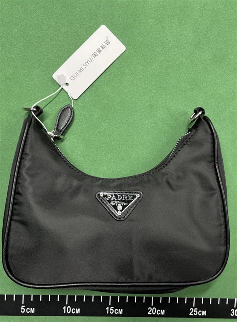 Just got the QC for my “PRADA” bag : .